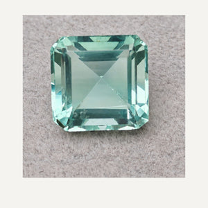 G768 FLUORITE EMERALD CUT 14.05CT - 01b-G768-CLEANED-GRAY-TRAY