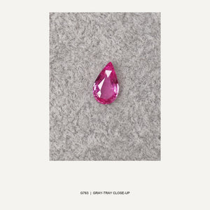 G763 UNHEATED PINK SAPPHIRE PEAR 1.52CT - 03-G763-GRAY-TRAY-CLOSEUP