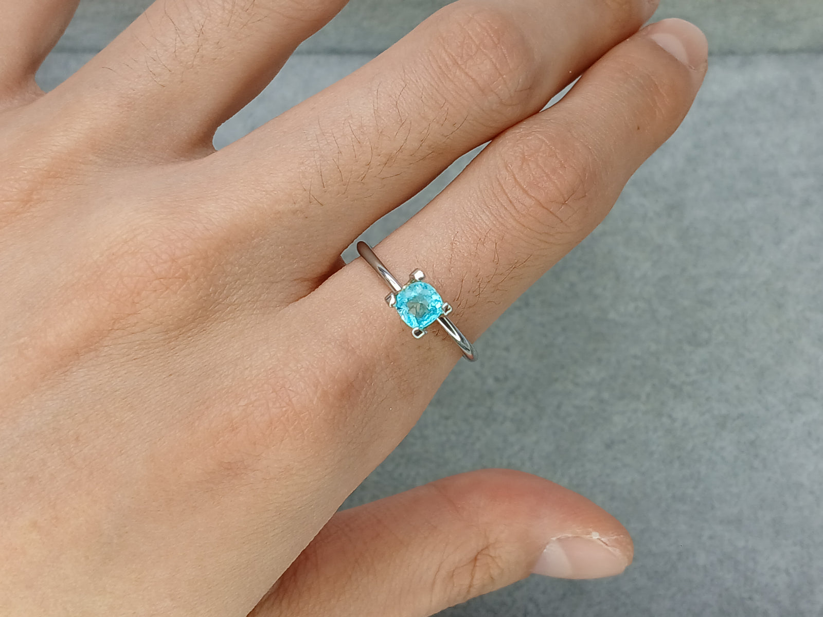 G735 PARAIBA TOURMALINE SOLITAIRE CUSH 0.59CT