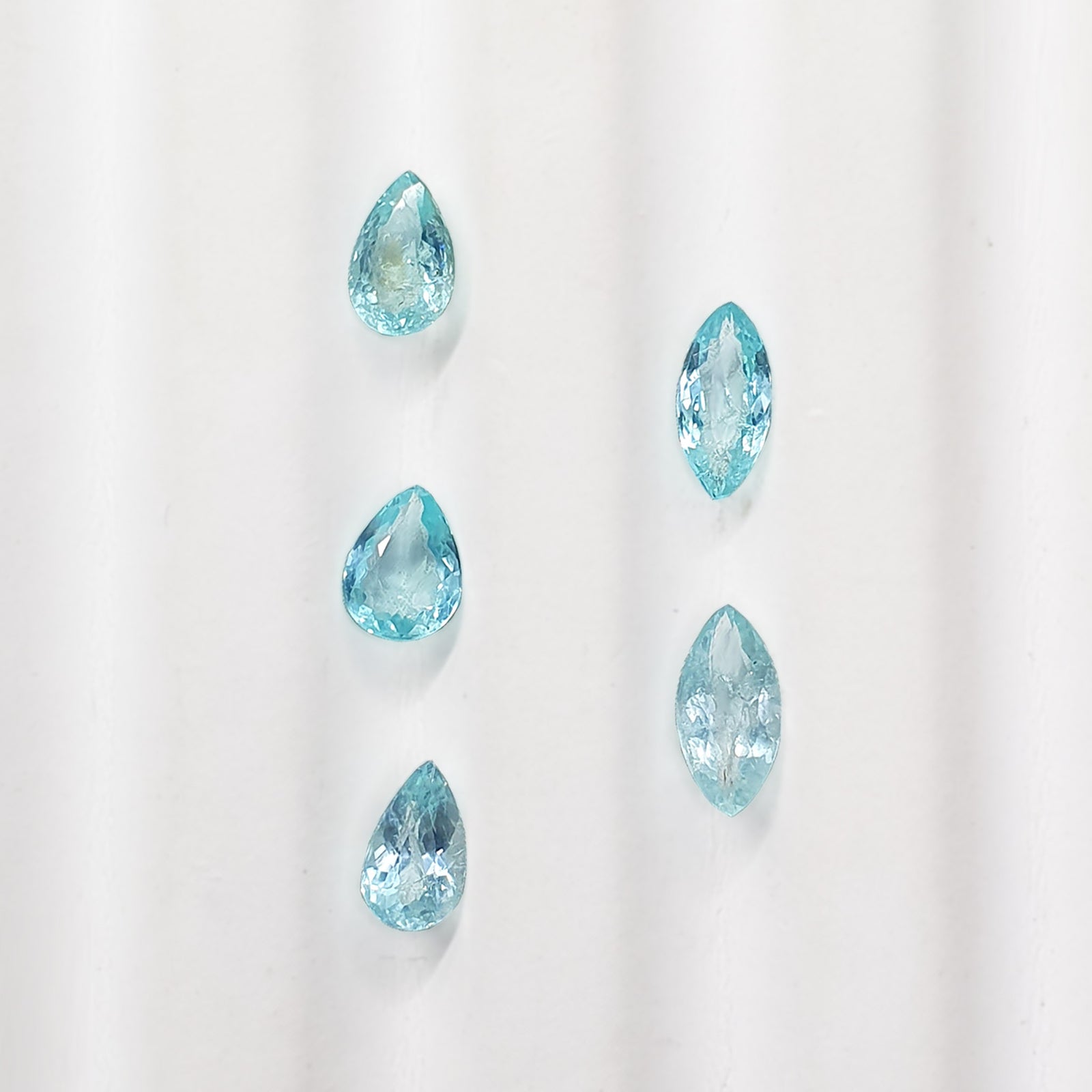 G737 PARAIBA TOURMALINE OVAL PEAR 0.6-0.7CT