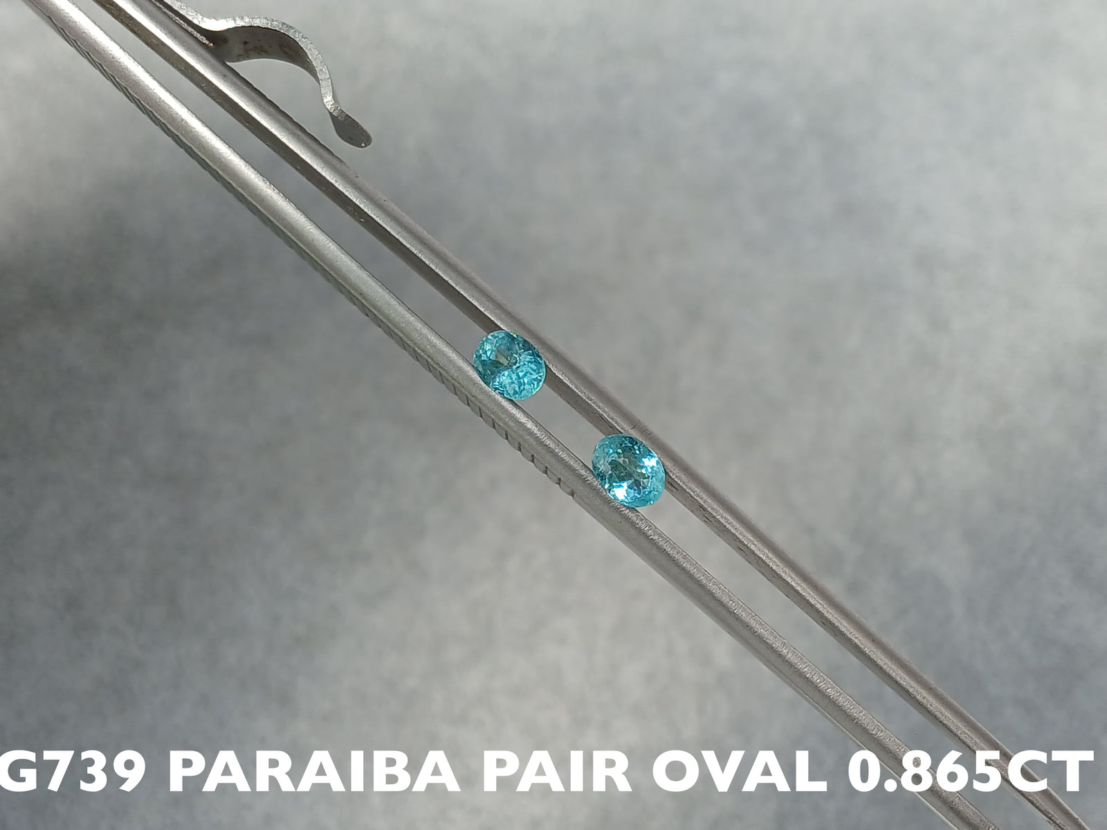 G739 PARAIBA TOURMALINE PAIR OVAL 0.55-0.865