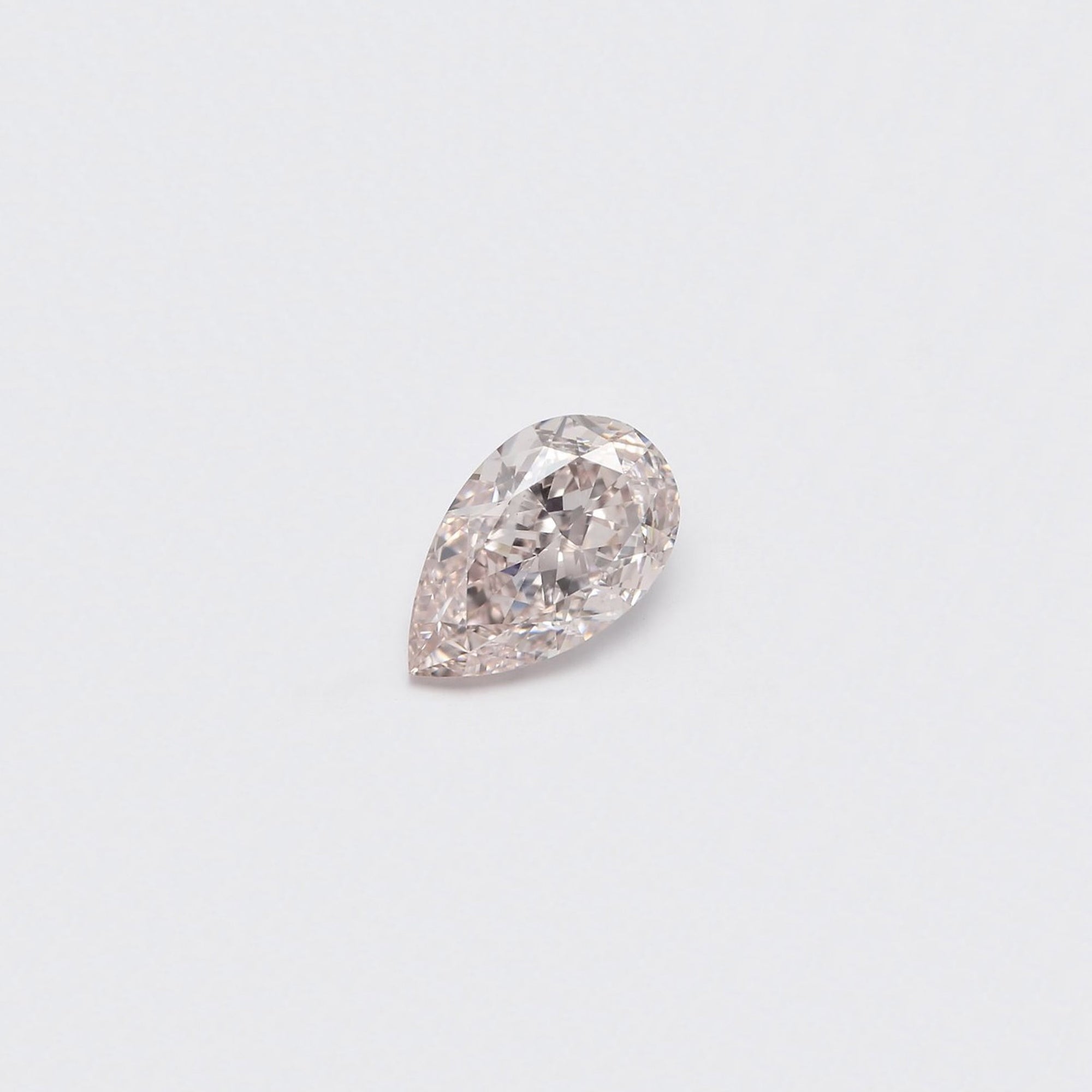 Fancy Light Orangy Pink Diamond Pear 1.02CT GIA M595