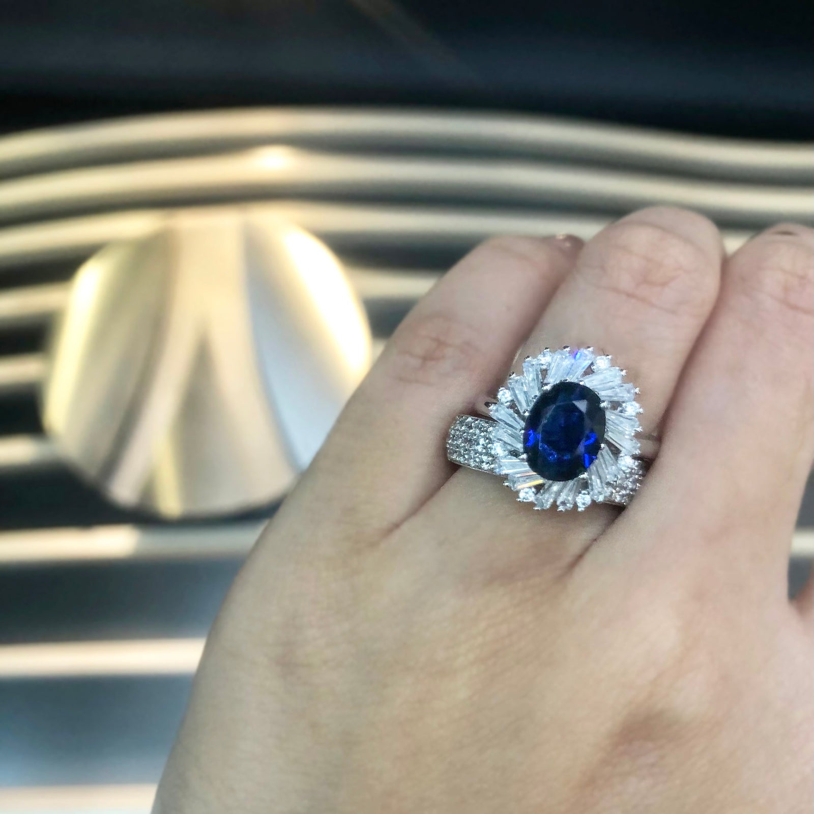 Jora Mix Tapered Baguette and Round Halo Ring - Sapphire Oval AG796-12