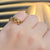 Nikito Buckle 18k Yellow Gold Ring AU151