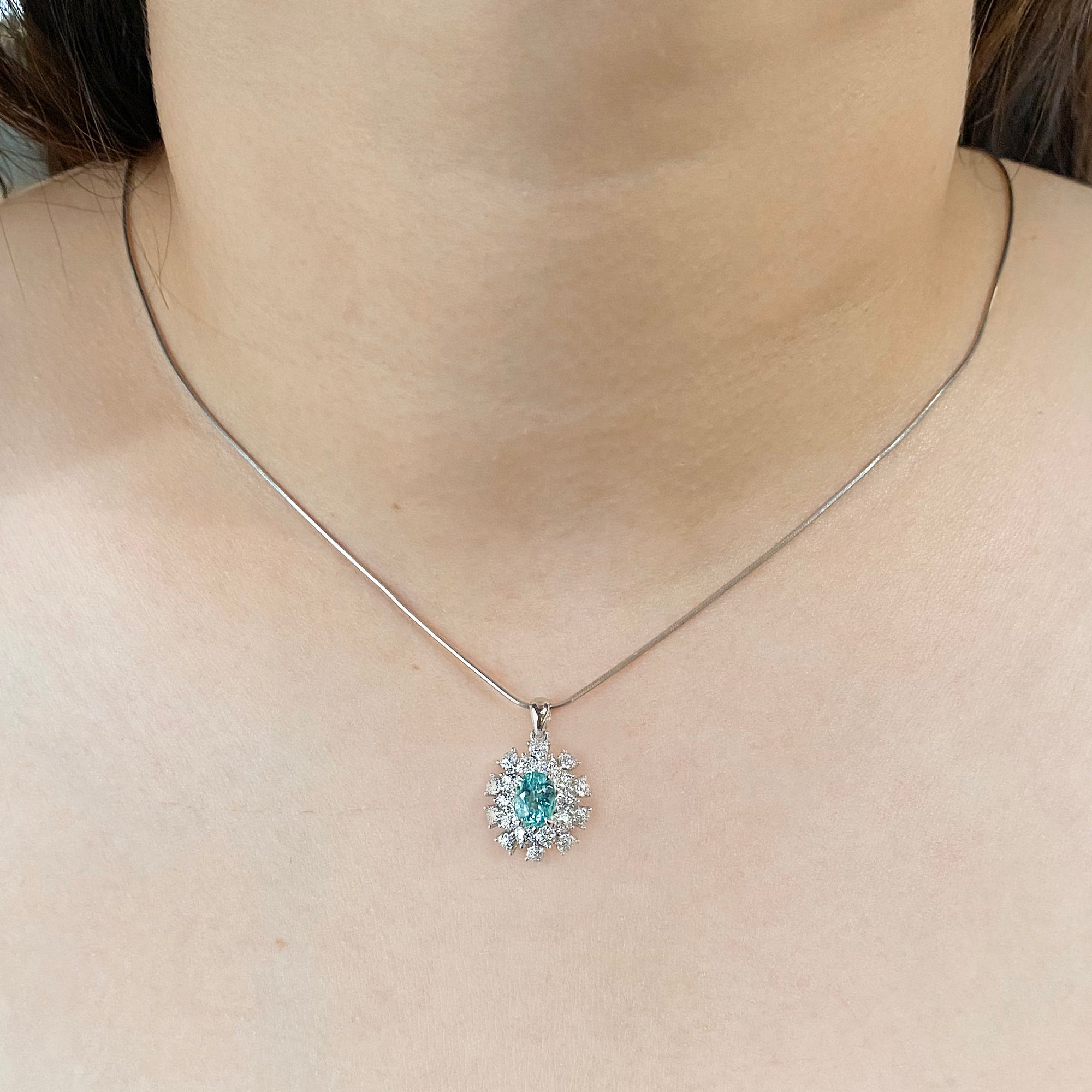 Snowy Paraiba Halo Oval Pendant AU400