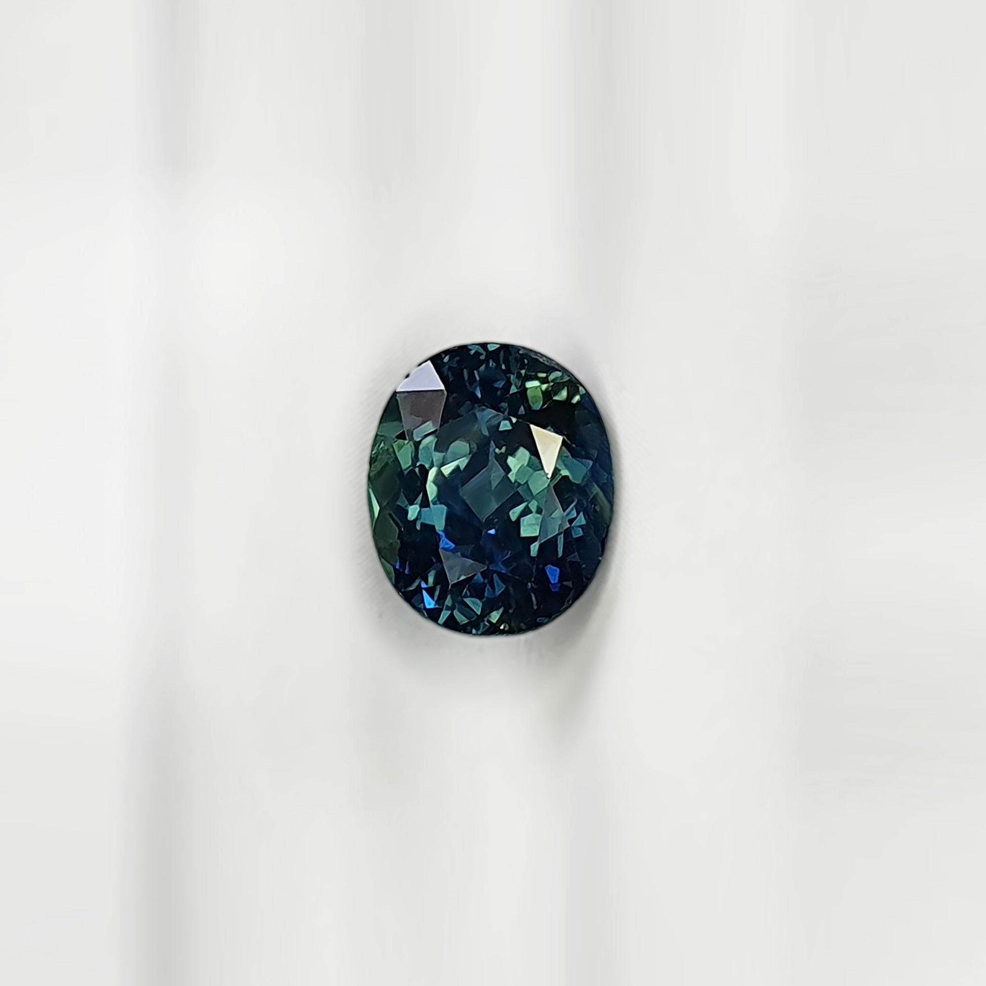 Teal Sapphire Oval Mixed Cut 2.41CT G099